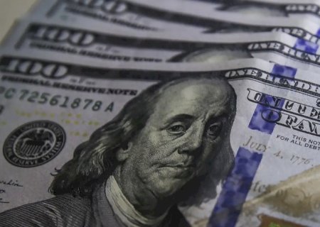 Dólar cai para R$ 5,17 após anúncio de recompra de títulos nos EUA